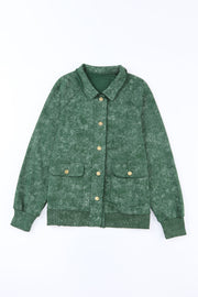 Green washed cotton utility jacket with two chest pockets and gold buttons.