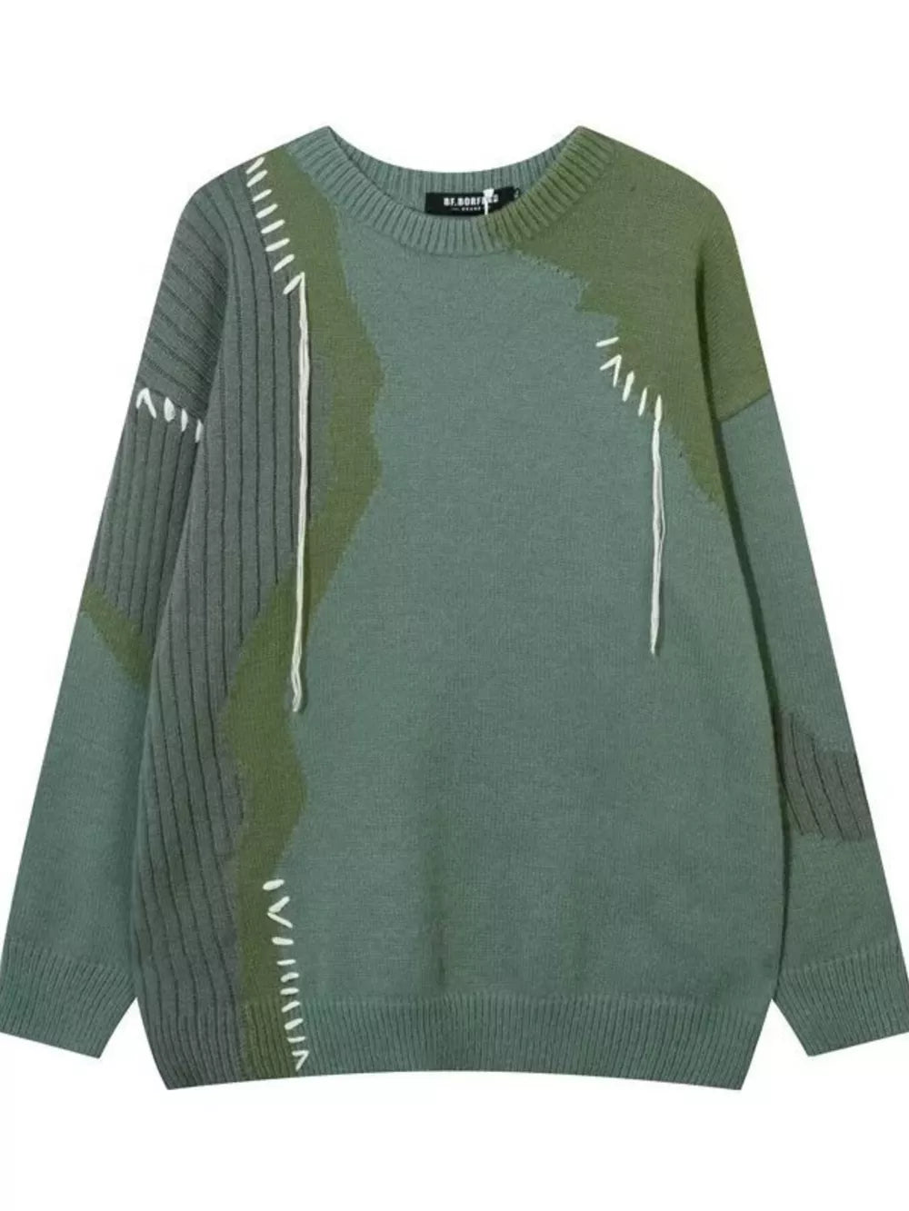 Men's green abstract contrast knit sweater with textured details and white stitching.