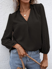 Black Swiss dot sleeve gathered blouse with V-neck and ruffled collar.