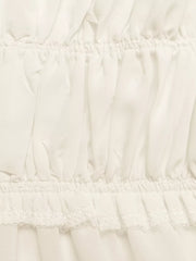 Gathered neckline peplum cami top in white with ruffled hem detail