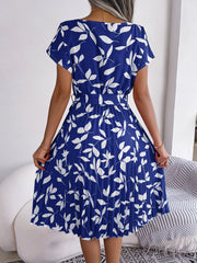 Blue leaf print midi dress with short sleeves and pleated skirt