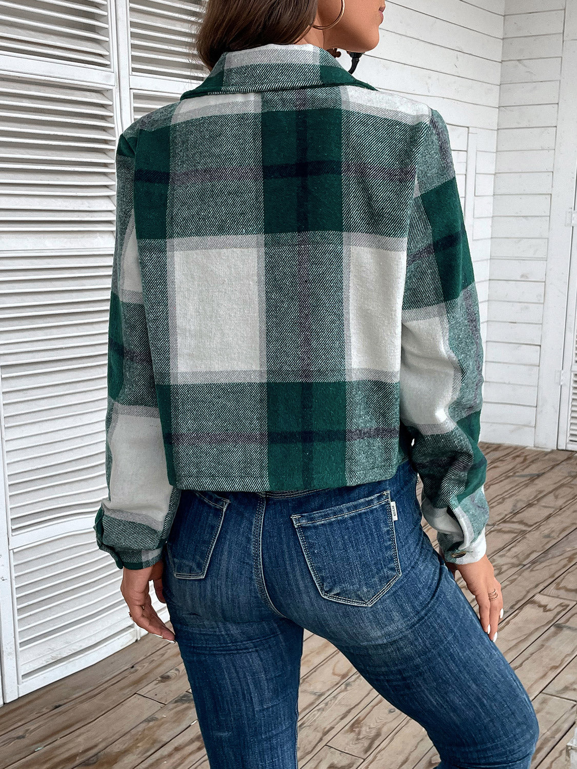 Green plaid cropped shirt jacket with statement collar and buttoned cuffs.