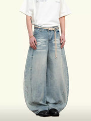 Belted wide leg denim jeans in light blue, 100% cotton, with a balloon silhouette.