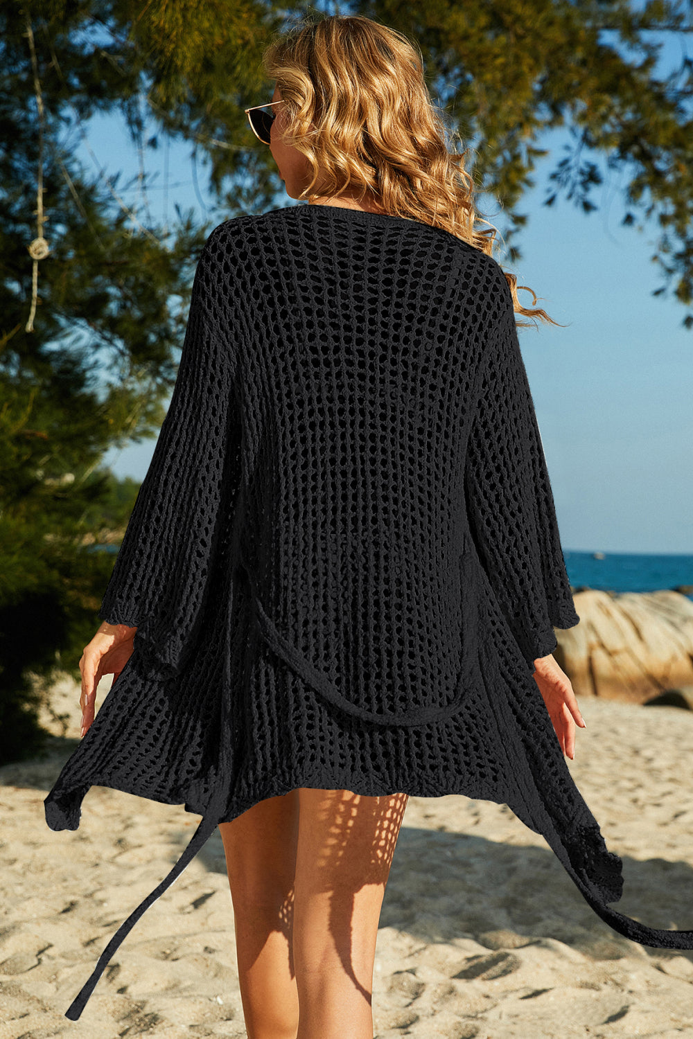 Black crochet bell-sleeve wrap cardigan with tie belt detail