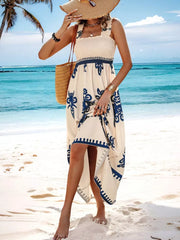 Maxi dress with smocked bodice, square neck, and blue floral print.