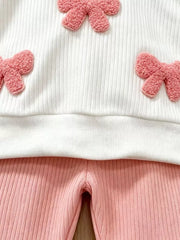 Children's Ruffled Long Sleeve Top And Flare Pants Set in White, close-up detail