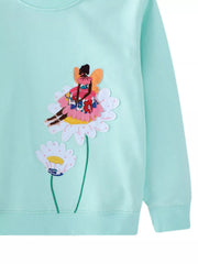 Aqua crew neck sweatshirt with embroidered fairy on flower applique.