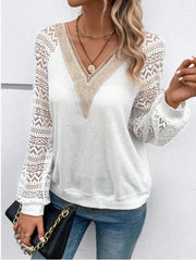 White waffle knit top with lace yoke and sleeves, V-neck, long sleeves.