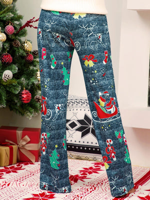 Festive print wide-leg lounge trousers in blue with Santa, reindeer, and Christmas tree patterns.