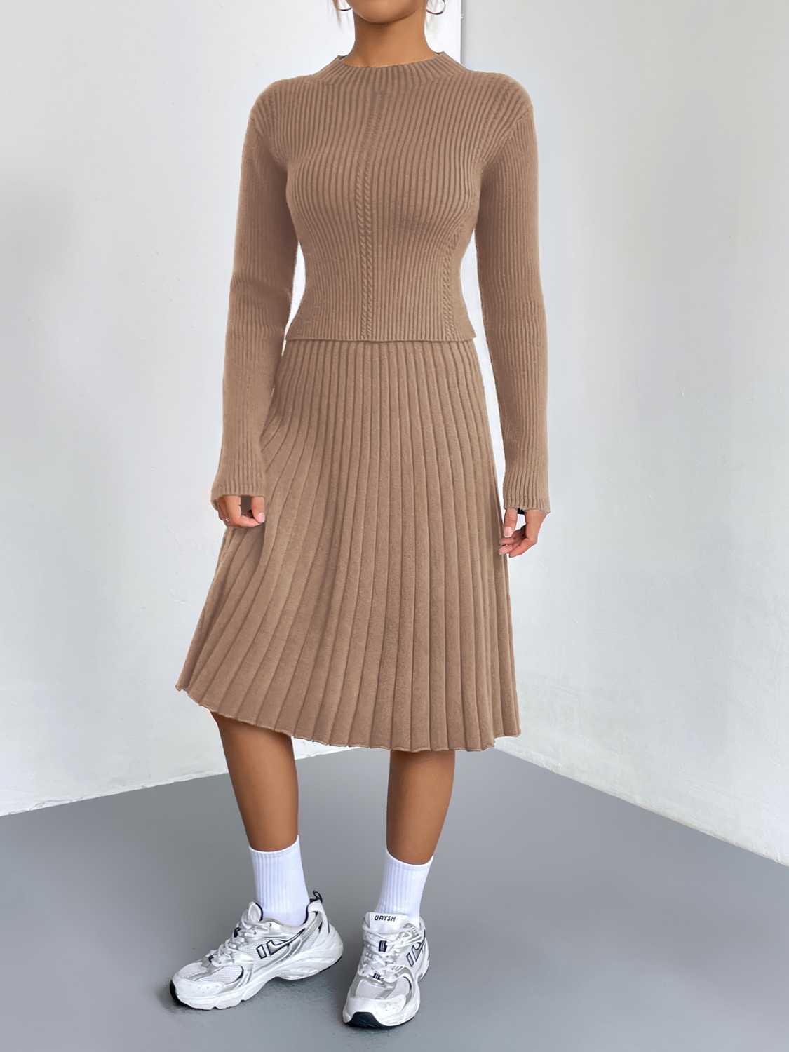 Dust Storm ribbed knit fit-and-flare co-ord with mock neck and pleated skirt.
