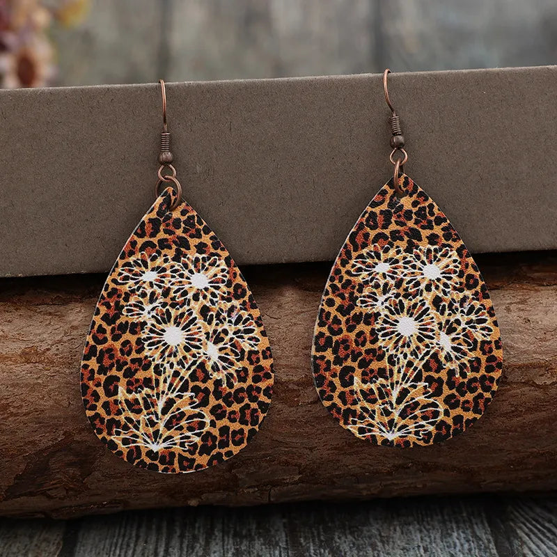 Brown leopard floral laser-cut teardrop earrings with white flower detail