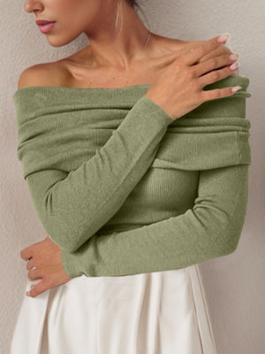 Sage off the shoulder knit sweater with long sleeves and a draped neckline.