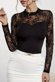 Black lace illusion bodysuit with sweetheart neckline and long sleeves.