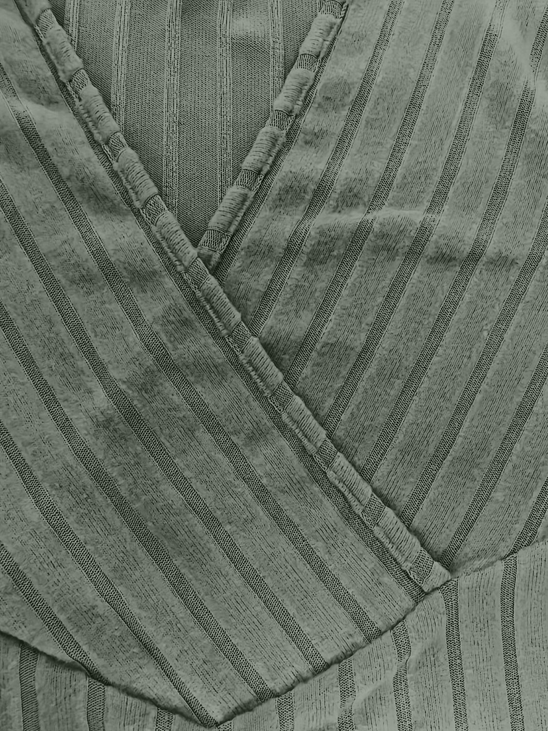 Sage ribbed wrap top with plunging neckline and vertical stripe detail