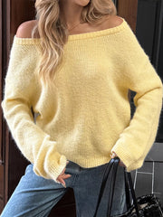 Pastel yellow ribbed knit sweater with off-the-shoulder neckline and relaxed fit.