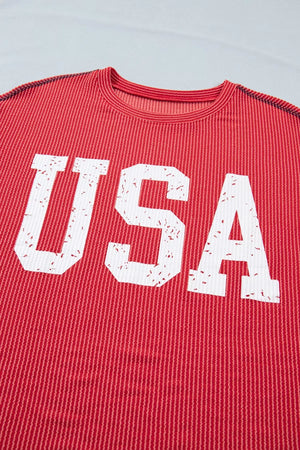Red twisted rib t-shirt with distressed white USA graphic and crew neck.