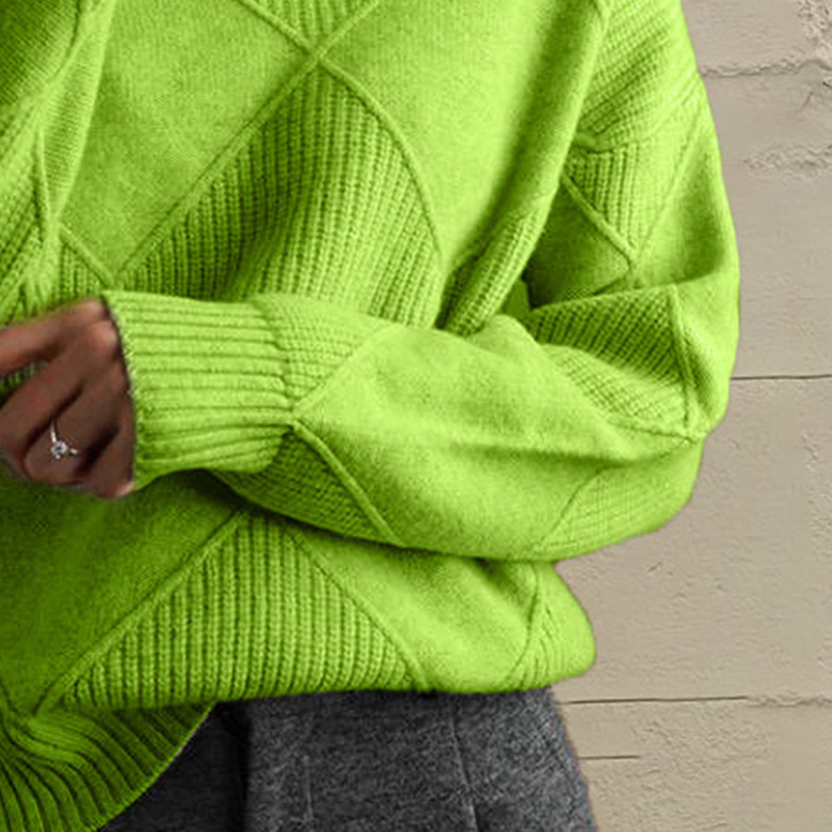 Yellow-green acrylic knit turtleneck sweater with diamond pattern and ribbed cuffs.