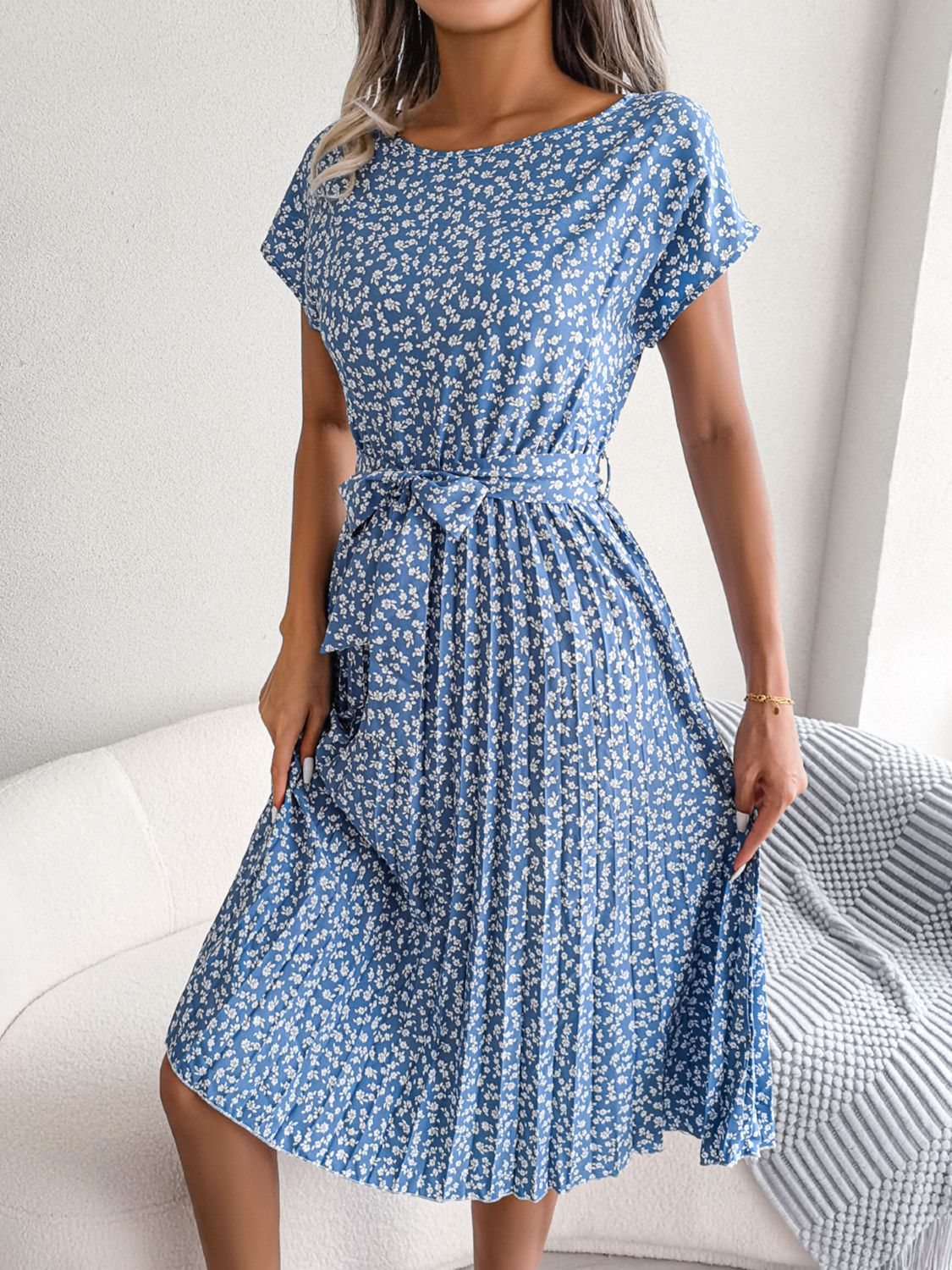 Sky blue floral print midi dress with tie waist and pleated skirt