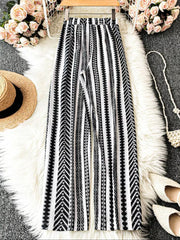 Black and white geometric print wide-leg maternity pants with a bow detail.