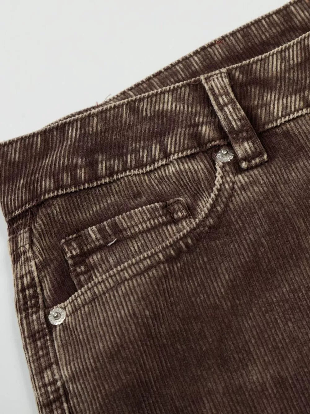 Brown corduroy joggers for men with wide-leg cut and button details.