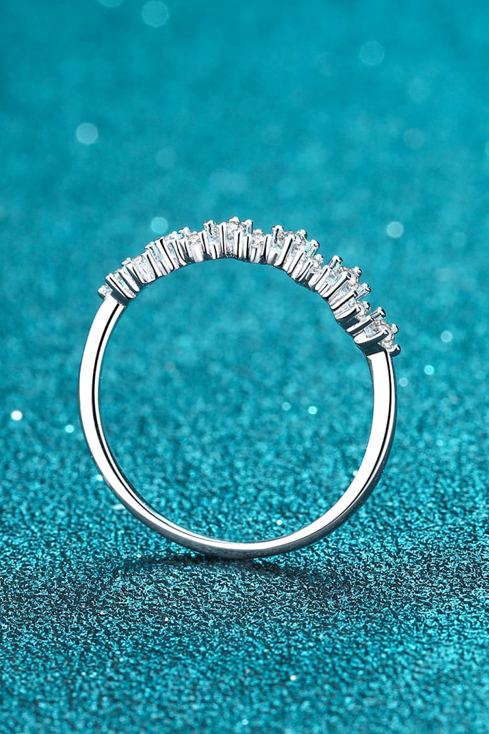 Silver zigzag ring with diamond cluster detail