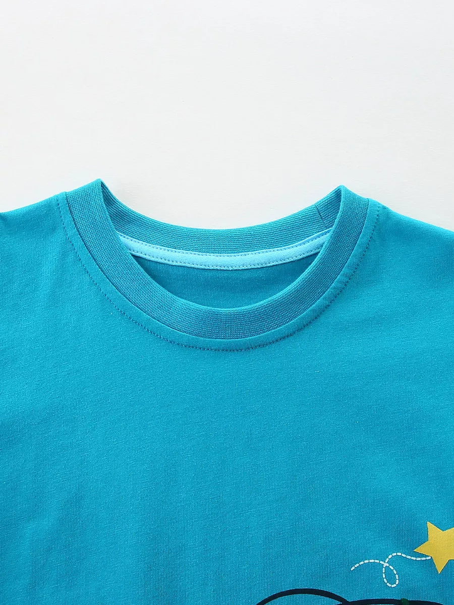 Blue cotton toddler t-shirt with a playful rocket graphic and a yellow star detail.
