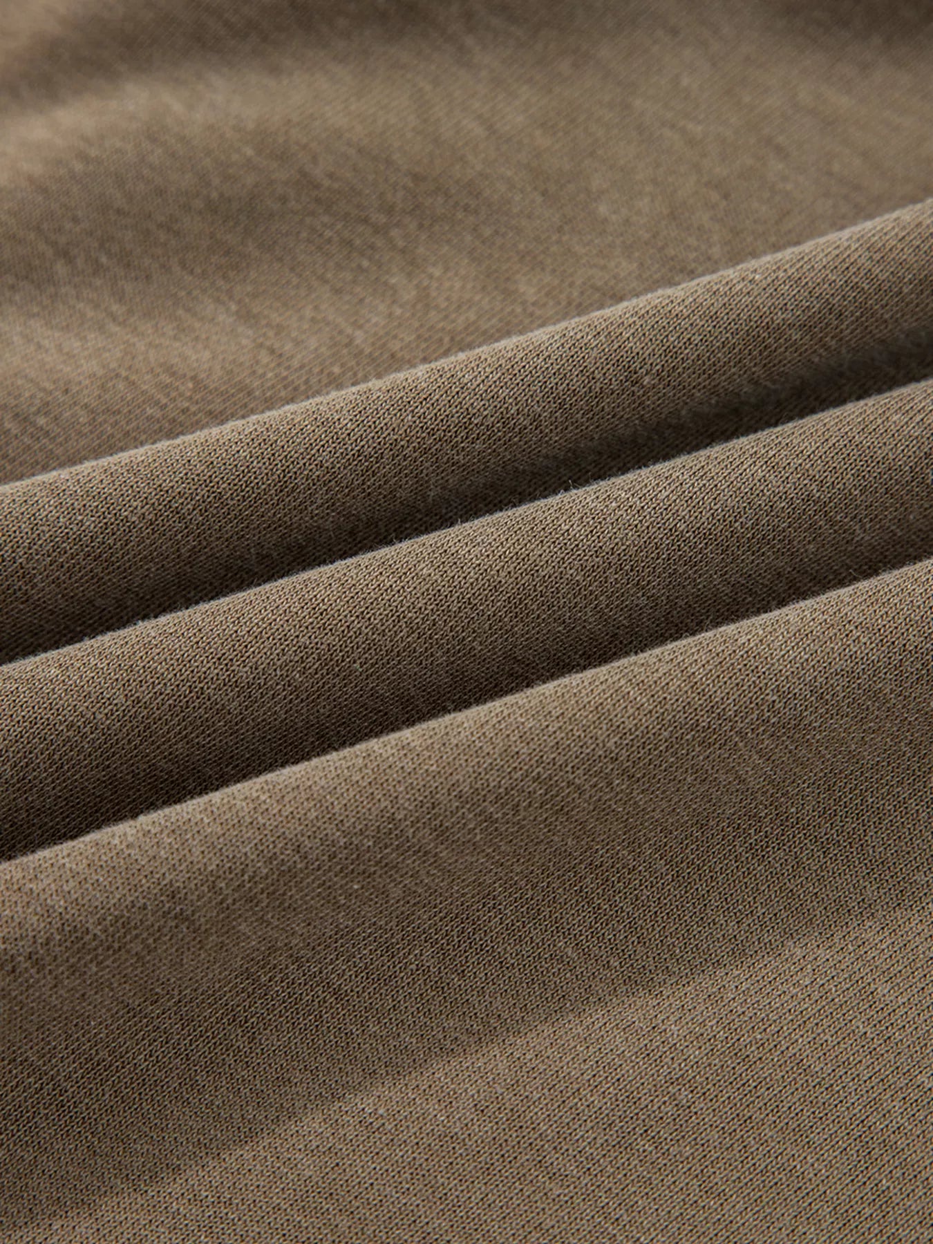 Mineral wash hoodie in coffee brown, showing textured fabric detail