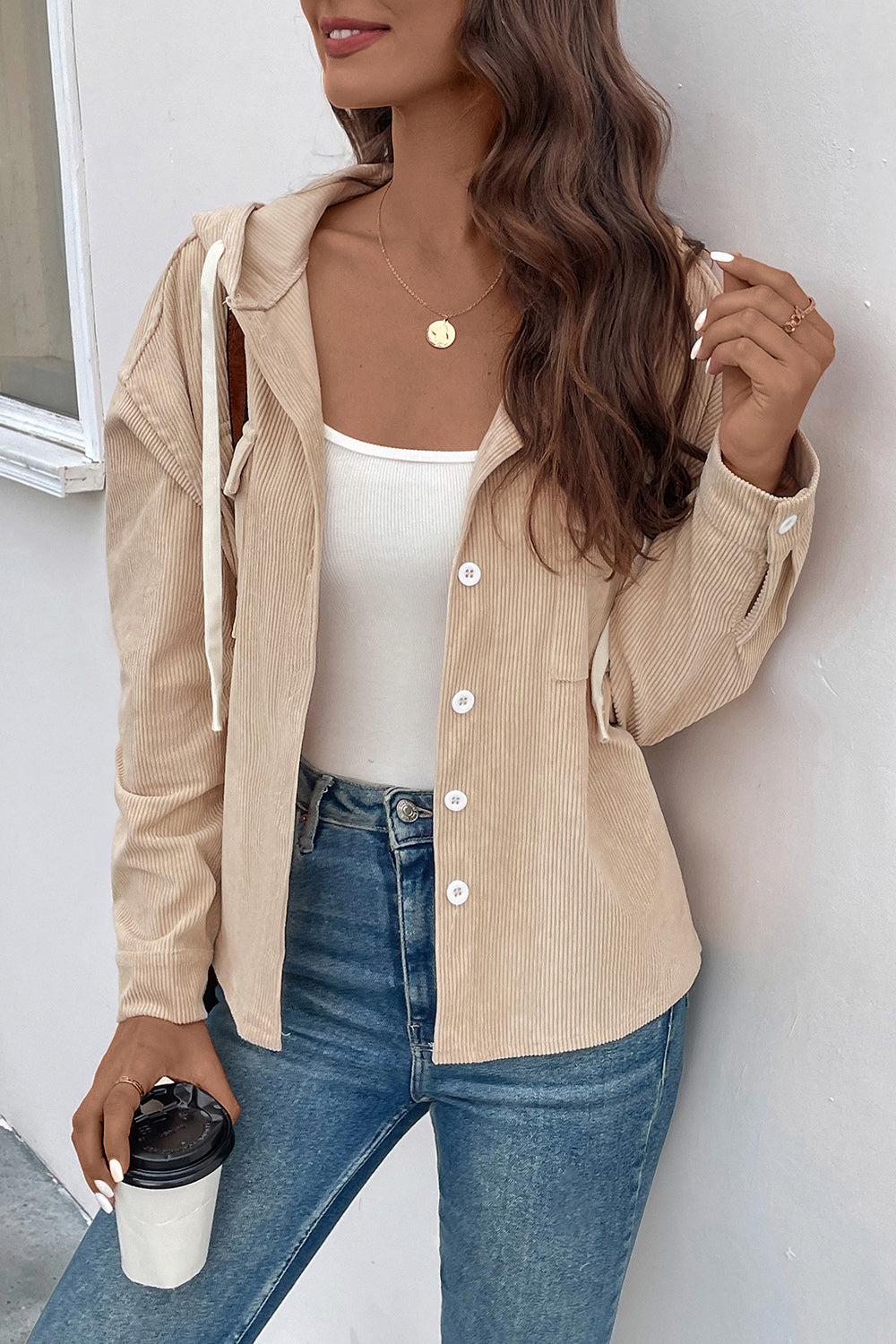 Sand ribbed button-up hoodie jacket with white drawstring and white buttons.