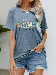 Misty Blue Mama Bunny graphic maternity t-shirt with colorful Easter-themed letters and bunny ears.