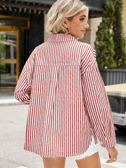Striped oversized shirt in scarlet with button front and long sleeves.