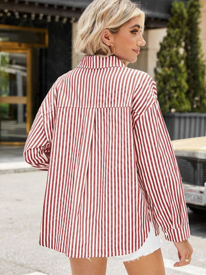 Striped oversized shirt in scarlet with button front and long sleeves.