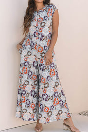 Floral cap-sleeve wide-leg jumpsuit with button detail and pockets
