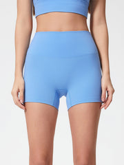 Light Blue Nova Rise High-Motion Shorts with seamless waistband and mid-thigh length.