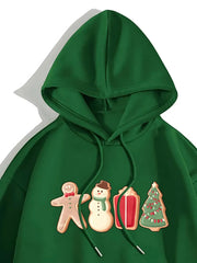 Green hoodie with gingerbread man, snowman, gift, and Christmas tree cookie graphics.