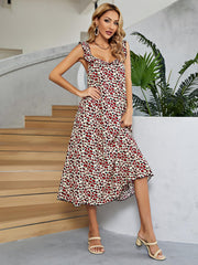 Leopard print midi dress in deep red with ruffle straps and a V-neck.