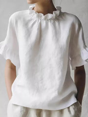 White ruffled neck half-sleeve shirt with ruffled cuffs.