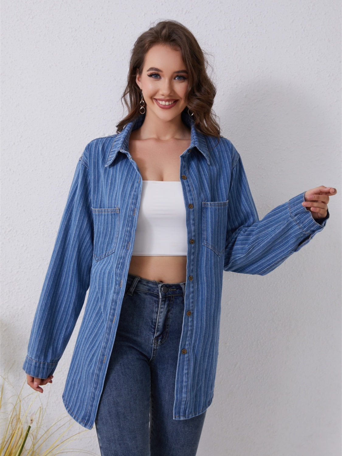Medium vertical stripe denim overshirt with pockets and collar.