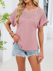 Pink waffle knit t-shirt with eyelet detail on the yoke and sleeves.