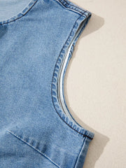 Denim vest with contrast trim detail on armhole, light wash cotton.