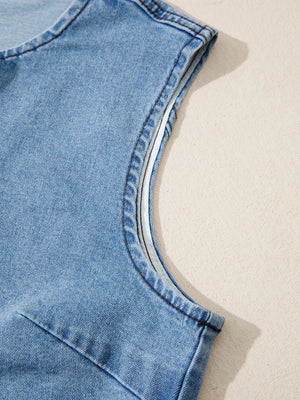 Denim vest with contrast trim detail on armhole, light wash cotton.