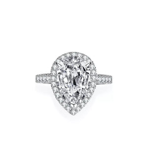 Elegant sterling silver ring with a brilliant pear-shaped moissanite center stone and halo detail.