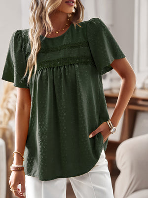 Textured puff sleeve yoke top in Black Forest with lace detail and short sleeves.