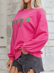 Pink crew neck cotton sweatshirt with green embroidered lucky clover detail
