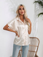 Champagne satin boxy sleeve button-down blouse with a relaxed fit.