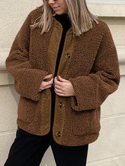 Brown teddy-texture button-up jacket with corduroy trim and button closure.