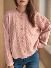 Dusty Pink cable knit cardigan with puff sleeves and gold buttons.