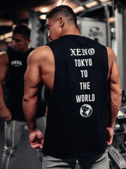 Black Xeno Tokyo graphic muscle tank top with globe detail.