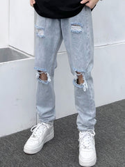 Light blue distressed slim fit men's jeans with ripped knees and frayed hems.