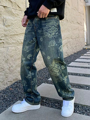 Men's dark wash denim jeans with heritage-inspired all-over floral print.