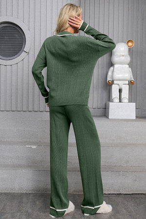 Dark green ribbed knit loungewear set with contrast trim on collar and cuffs.